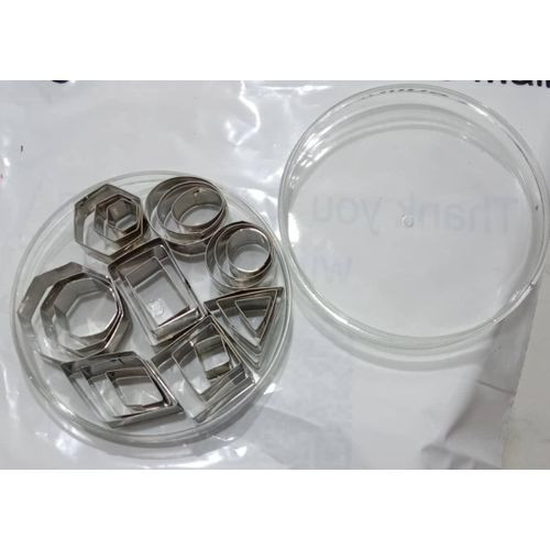 Set Of Stainless Steel Cookie Cutters And Shapers In A Case- Silver