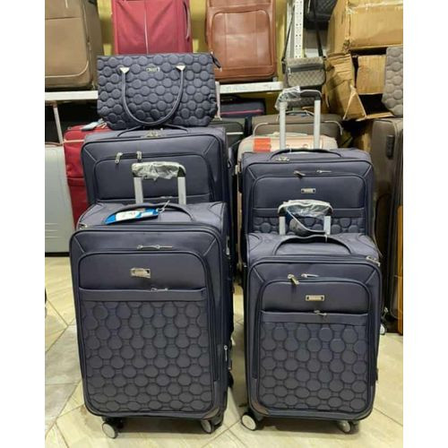 A set of 5 In 1 Suitcase Purely Cloth It's Has 8-Wheel Spinner It Has Strong Material It's Extremely Durability It Has Hard Body